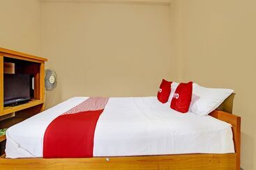 Отель Oyo 92200 Kalegan 1 Guesthouse