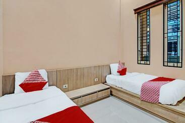 Отель Oyo 91949 Ameera Homestay Syariah