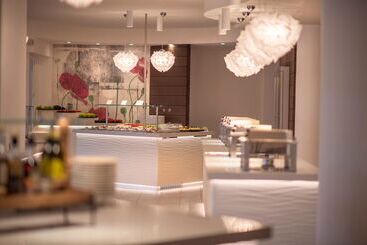 Отель Chia Laguna Resort - Spazio Oasi