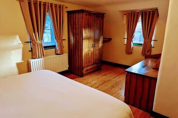 Дом Millers Close Holiday Cottages