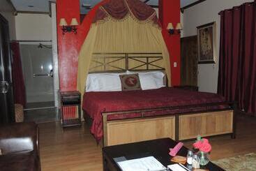 צימר The Whispering Pines Inn