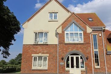 مبيت وإفطار Redlands Farm