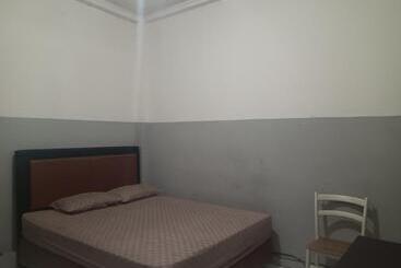 호텔 Oyo 93090 Multi Plus Inn