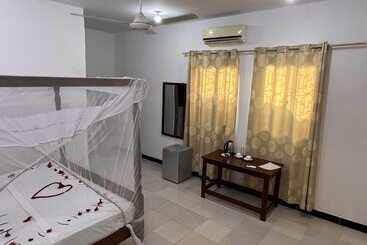 Отель Nungwi Beach Front