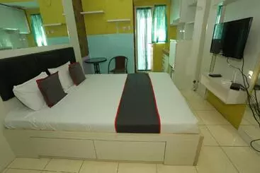 ホテル Capital O 93371 Pelangi Residence 5