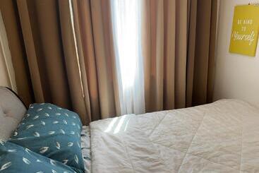 هتل آپارتمان Hm Cozy Place Beside Enchanted Kingdom