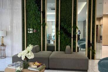 Aparthotel Chic, Modern , Minimalist Design At The Loop Condo Tower