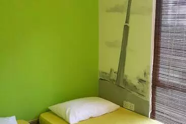 هاستل Pods The Backpackers Home & Cafe