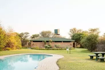 کلبه Woodlands Stop Over And Lodge