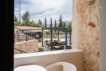 Отель Dionysos Apartments And Studios