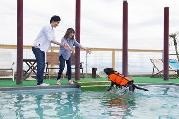 Отель Izukogen Wanwan Paradise Condominium