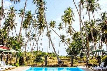 Hotell Green Parrot Beach Resort