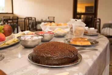 Отель Coesa Hoteis