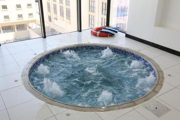 هتل Belle Tower Apartments