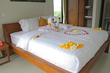 ペンション Umah Tikari Guesthouse