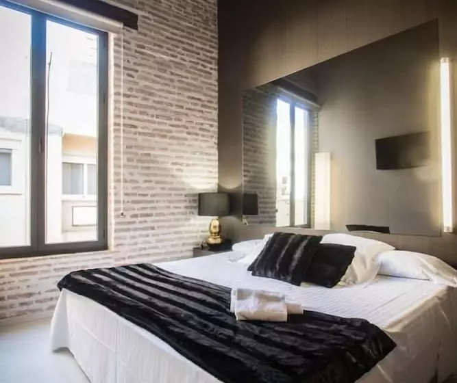 فندق صغير Cosy Rooms Embajador