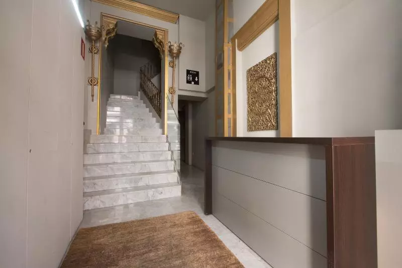 فندق صغير Cosy Rooms Embajador