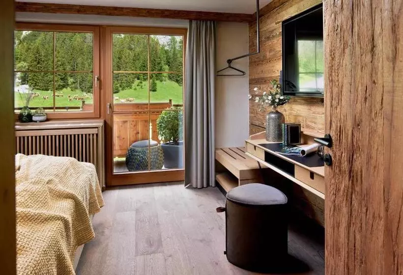 Отель Gramai Alm Alpengenuss & Natur Spa