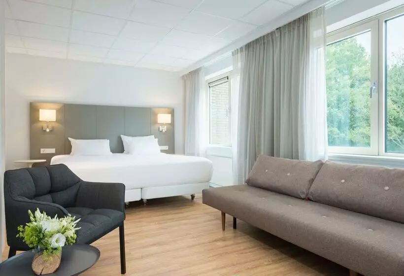 Отель NH Eindhoven Conference Centre Koningshof
