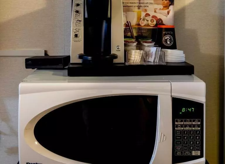 Отель Perfect Inns & Suites