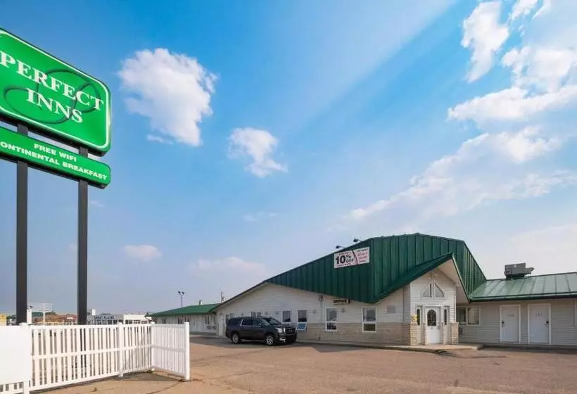 Отель Perfect Inns & Suites