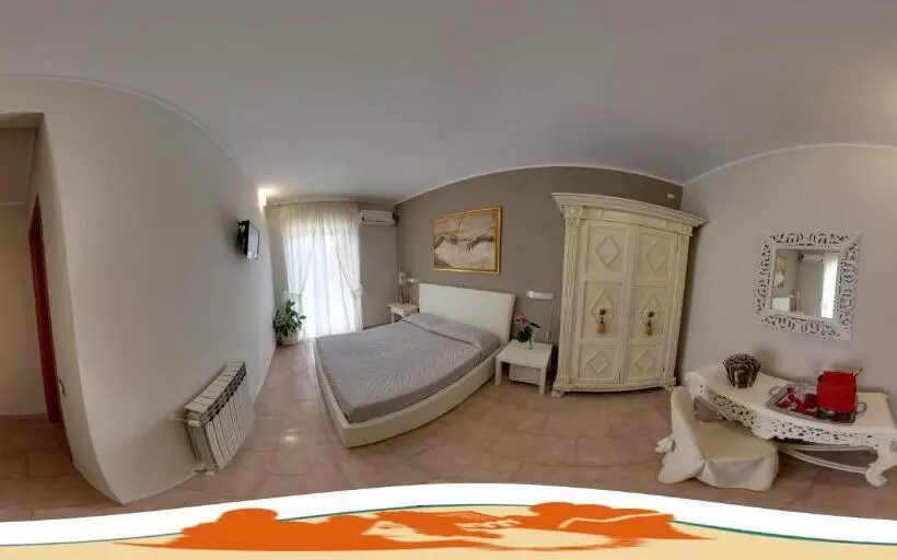 Отель Velcamare