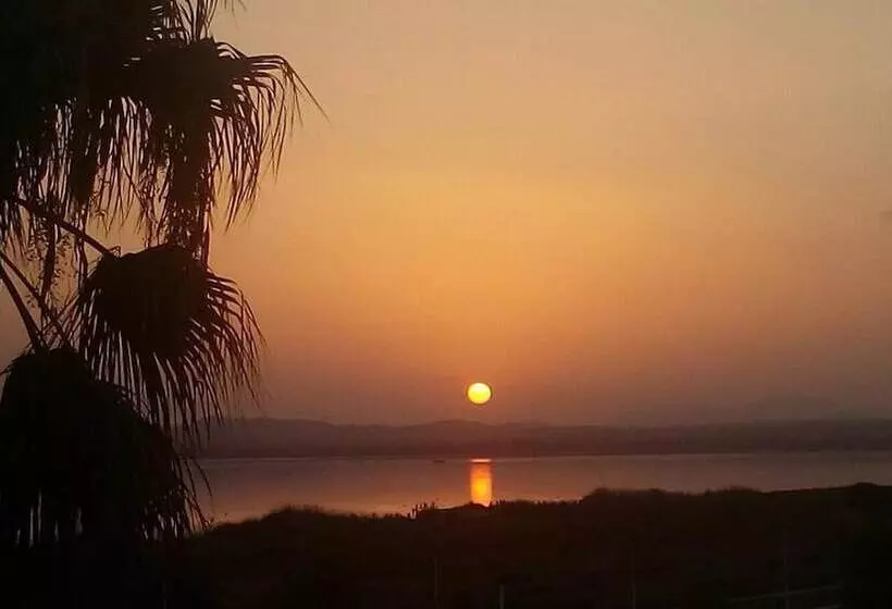 تختخواب و صبحانه Casa Frente Al Lago Rosa