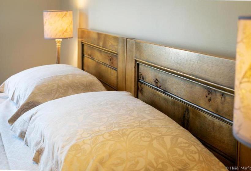 مبيت وإفطار Tucked Away House