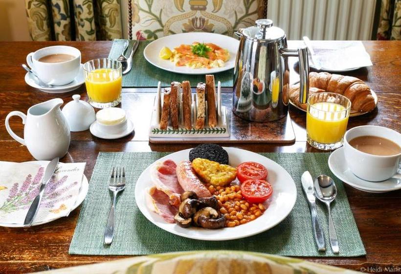 مبيت وإفطار Tucked Away House