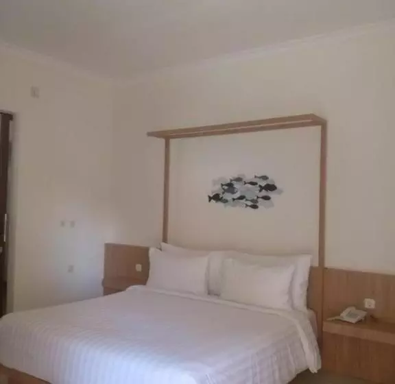 تختخواب و صبحانه New Belitung Holiday Resort