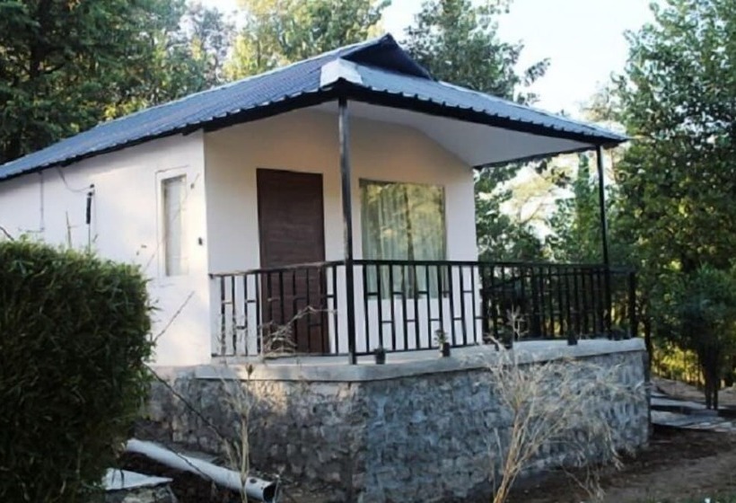 בית מלון כפרי Dev Bhoomi Farms & Cottages