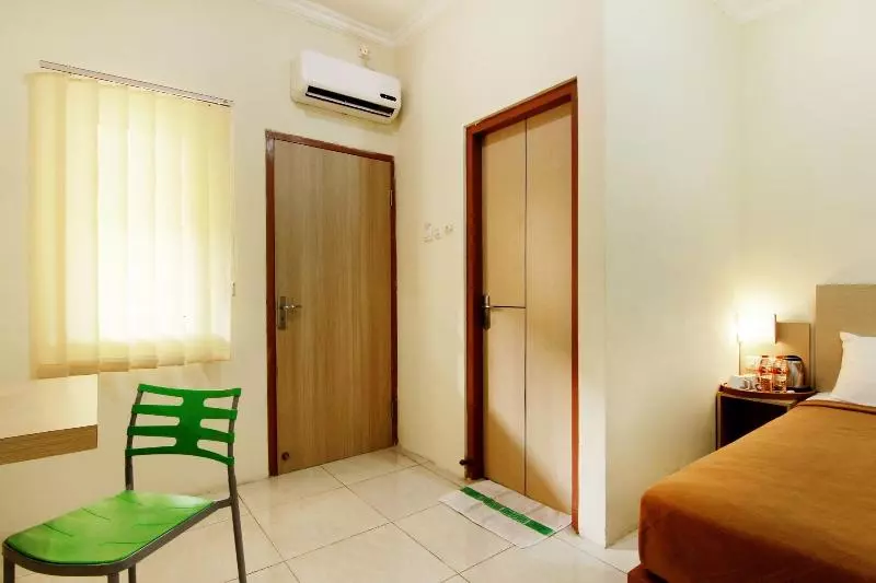 ペンション Masrilink's Guest House
