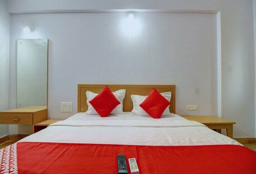 Отель Capital O 13489 Garuda Comforts