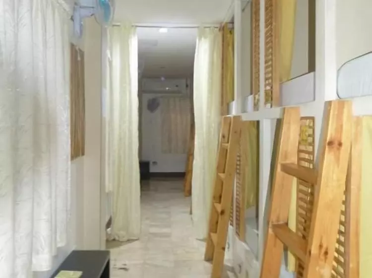 His Capsule Hostel