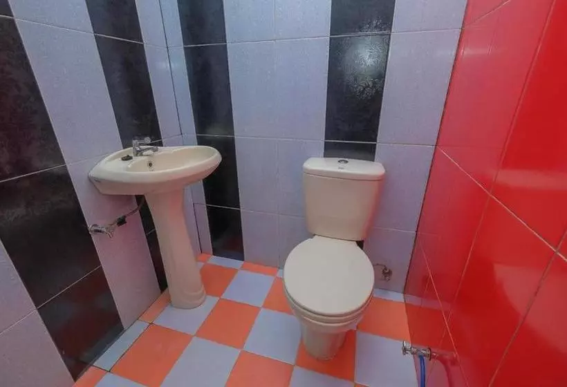 ペンション Reddoorz Syariah Near Syamsudin Noor Airport 2