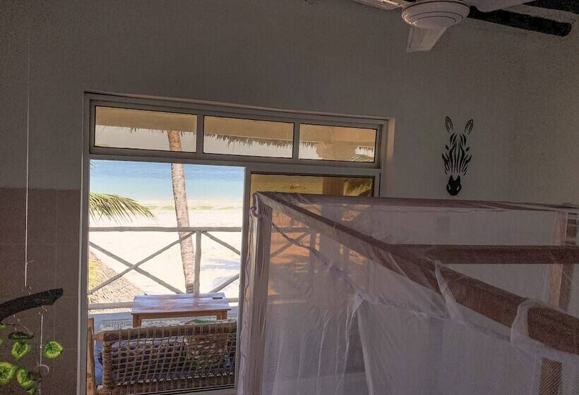 בית מלון כפרי The African Paradise Beach