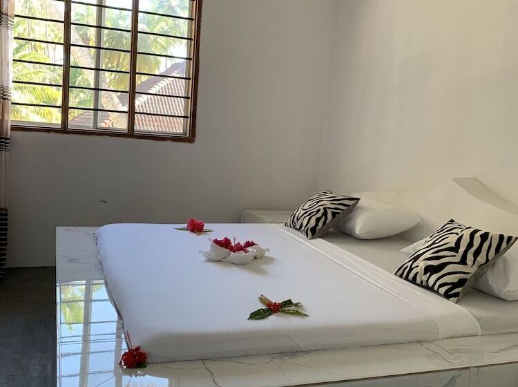 בית מלון כפרי The African Paradise Beach