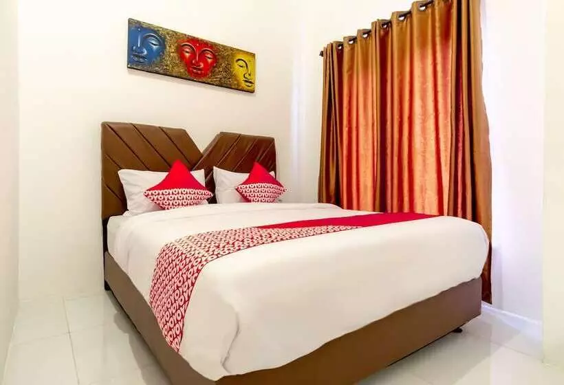 ホテル Capital O 92444 Kamojo Guest House