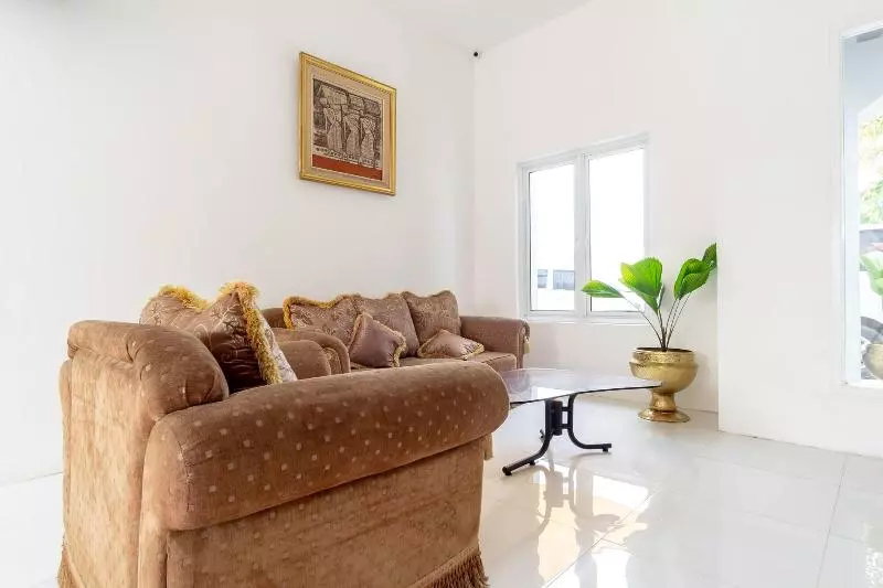 ホテル Capital O 92444 Kamojo Guest House