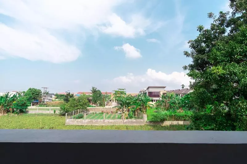 ホテル Capital O 92444 Kamojo Guest House