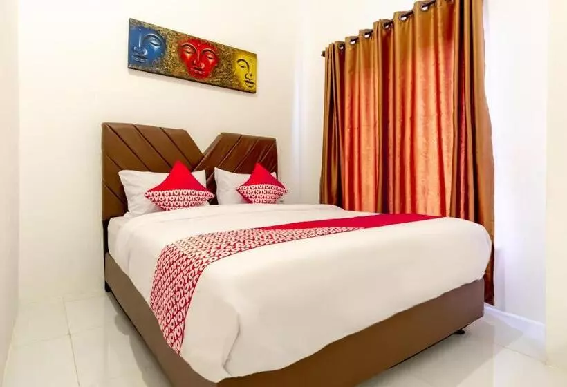 ホテル Capital O 92444 Kamojo Guest House