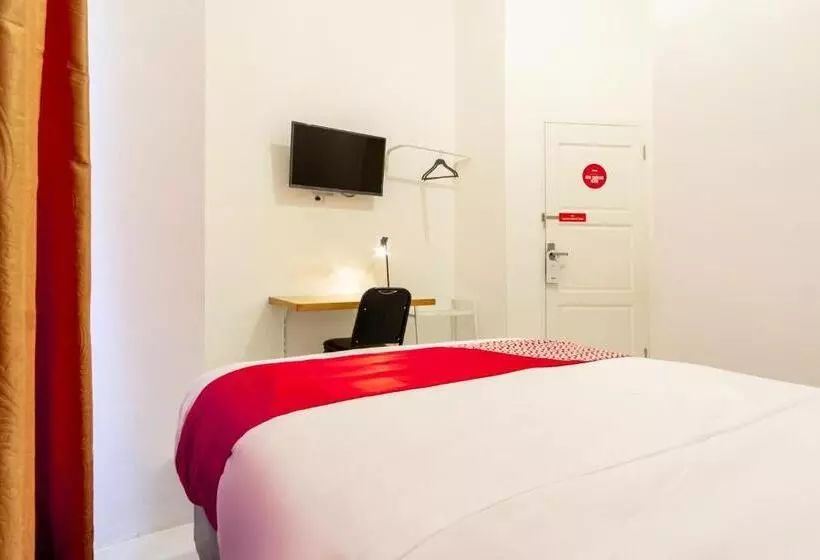 ホテル Capital O 92444 Kamojo Guest House