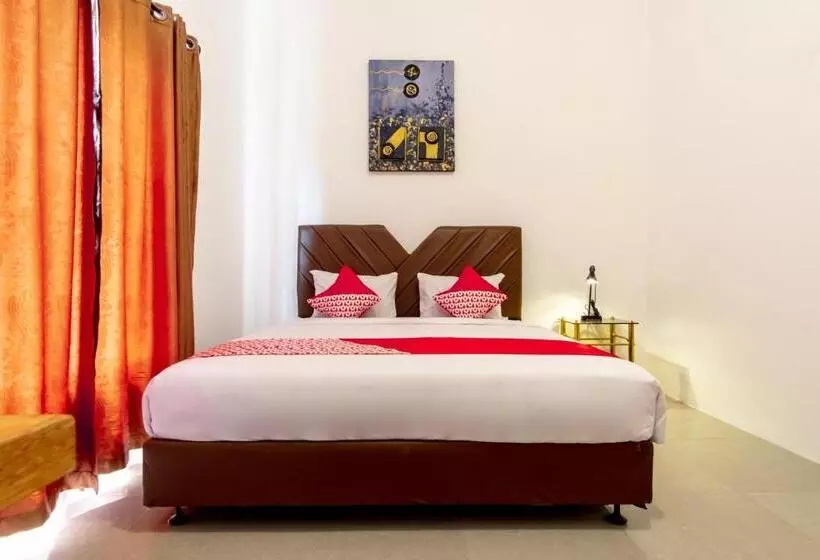 ホテル Capital O 92444 Kamojo Guest House