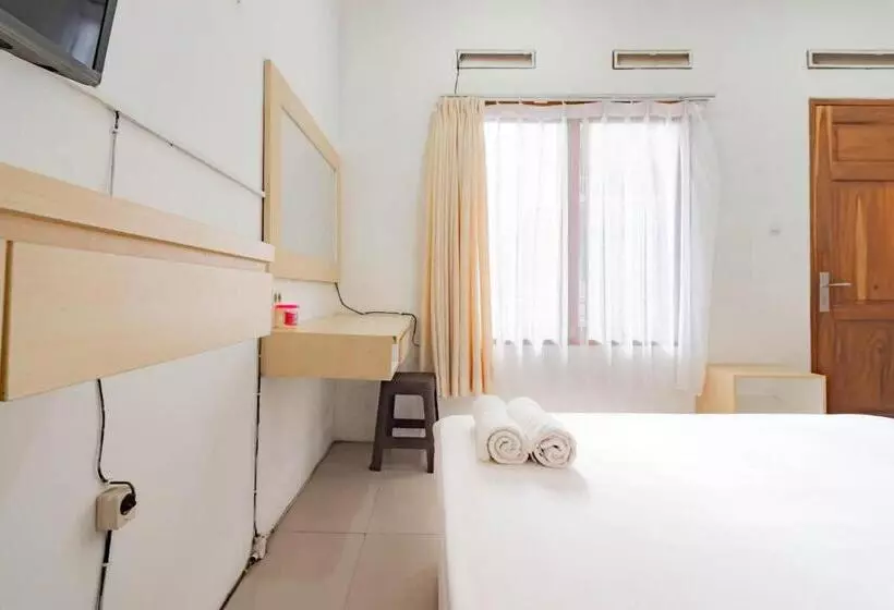 Urbanview Hotel One Family Maribaya By Reddoorz