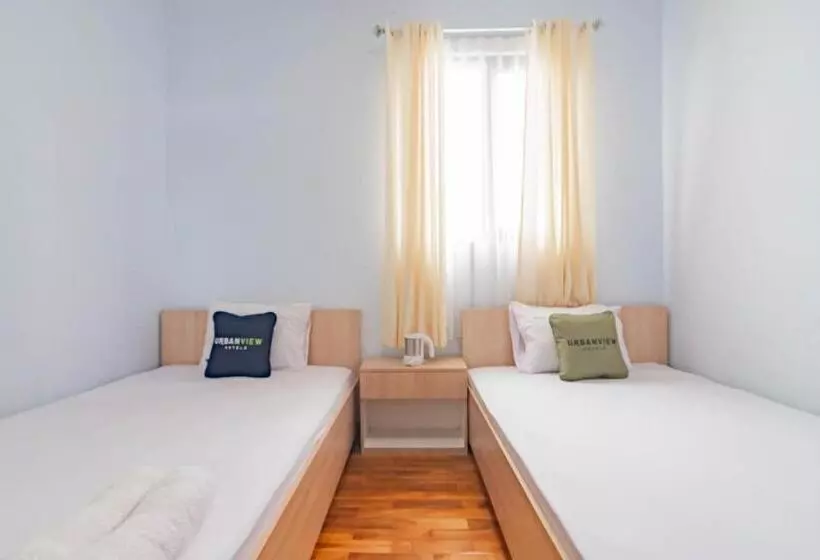 Urbanview Hotel One Family Maribaya By Reddoorz