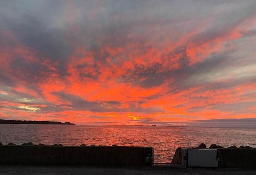 تختخواب و صبحانه Sunset Inn Churasun