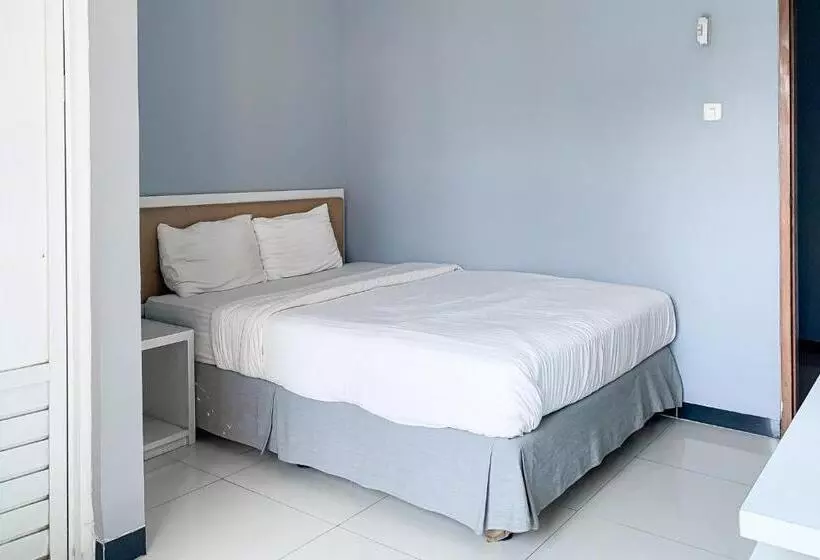 هتل Karins Guesthouse Syariah Redpartner