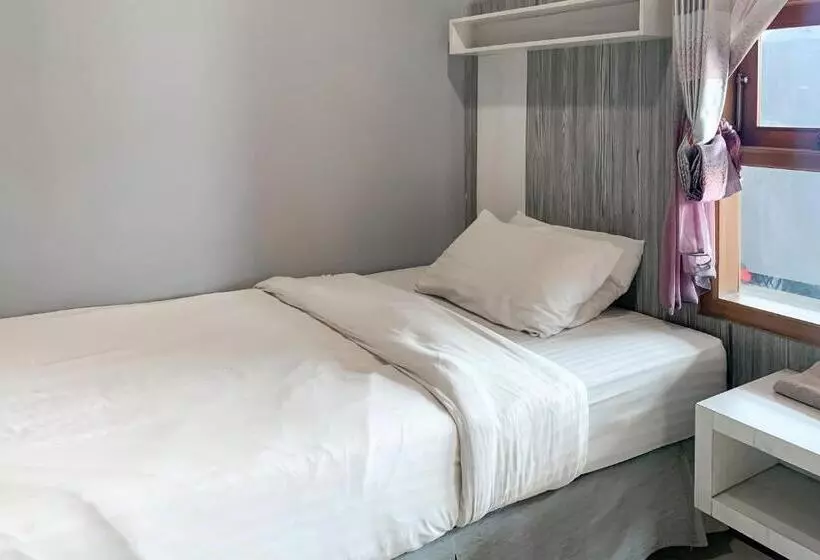 هتل Karins Guesthouse Syariah Redpartner