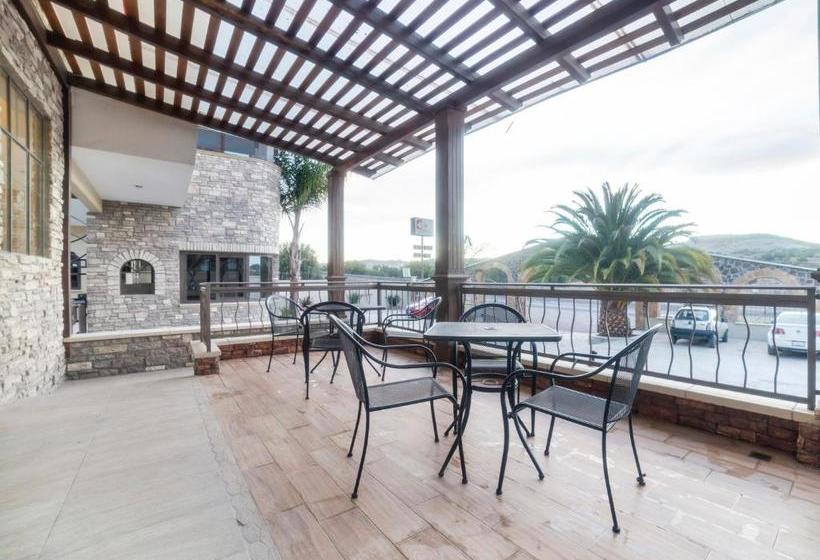 Отель Capital O Descanso Inn