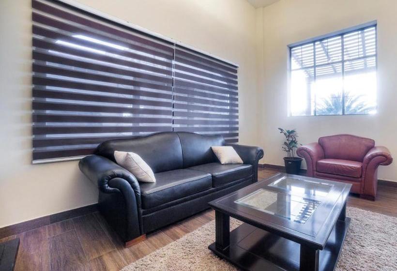 Отель Capital O Descanso Inn